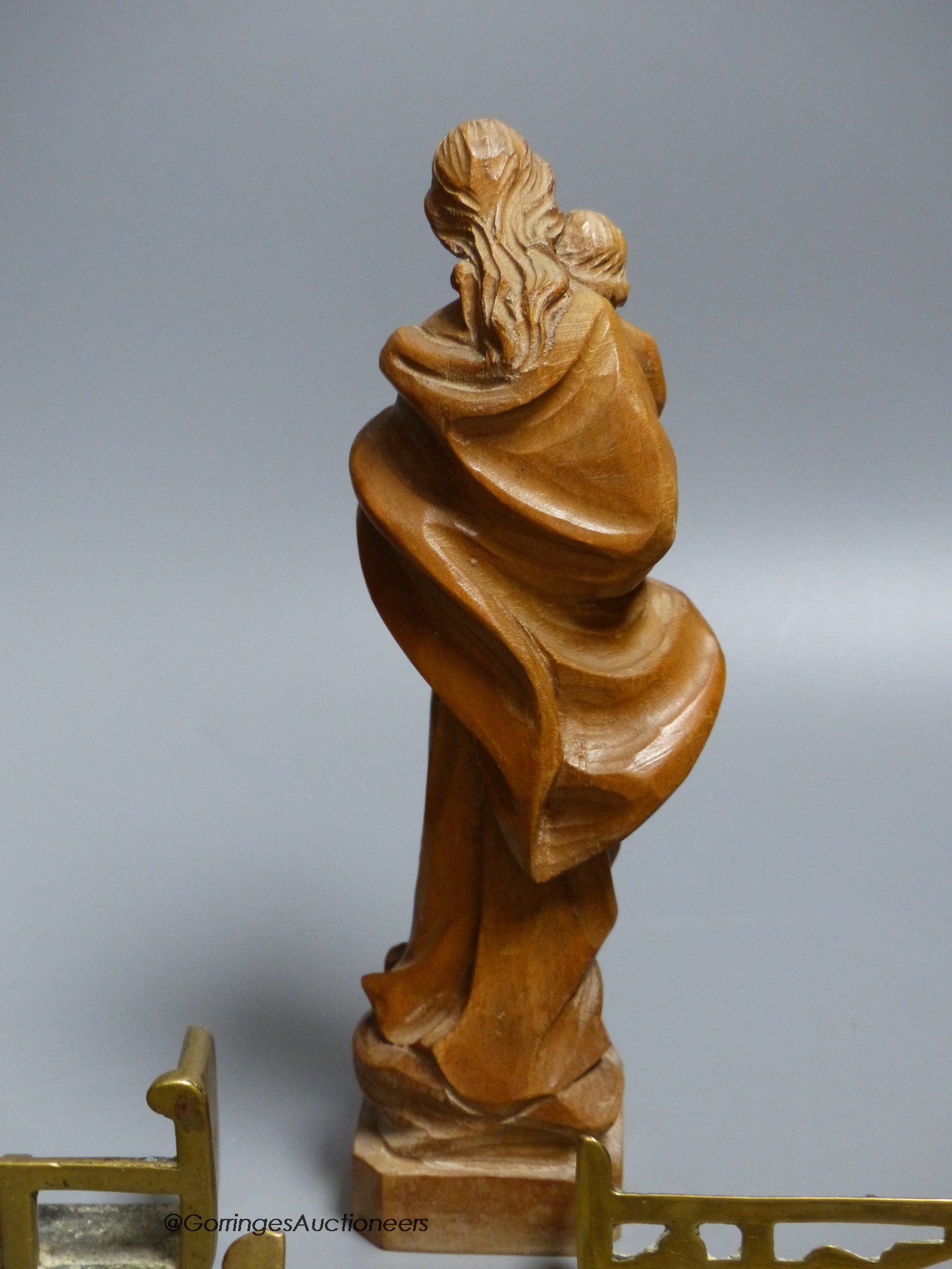 A limewood Madonna and child, height 20cm, and six miniature fenders